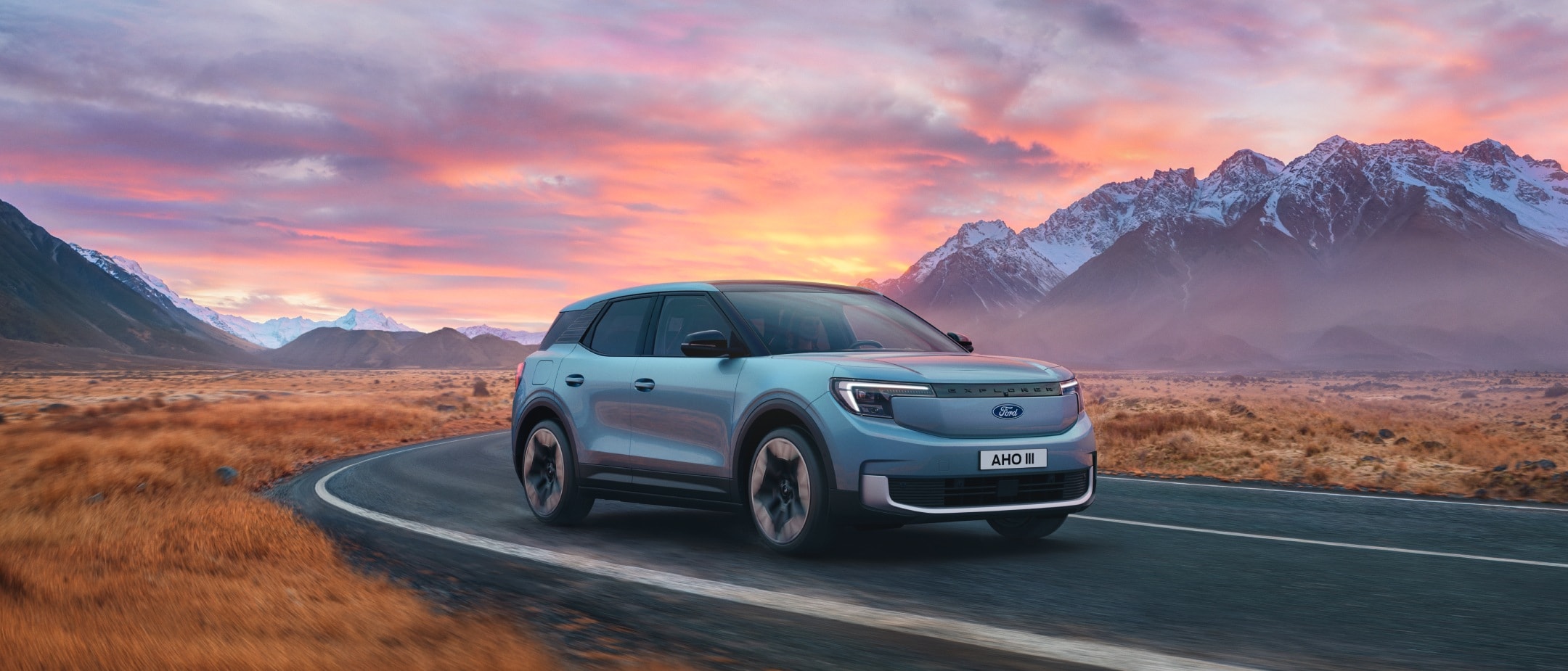 The New All-Electric Explorer being driven through wild landscape