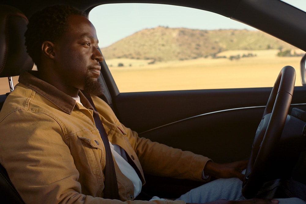 A man driving using Ford BlueCruise