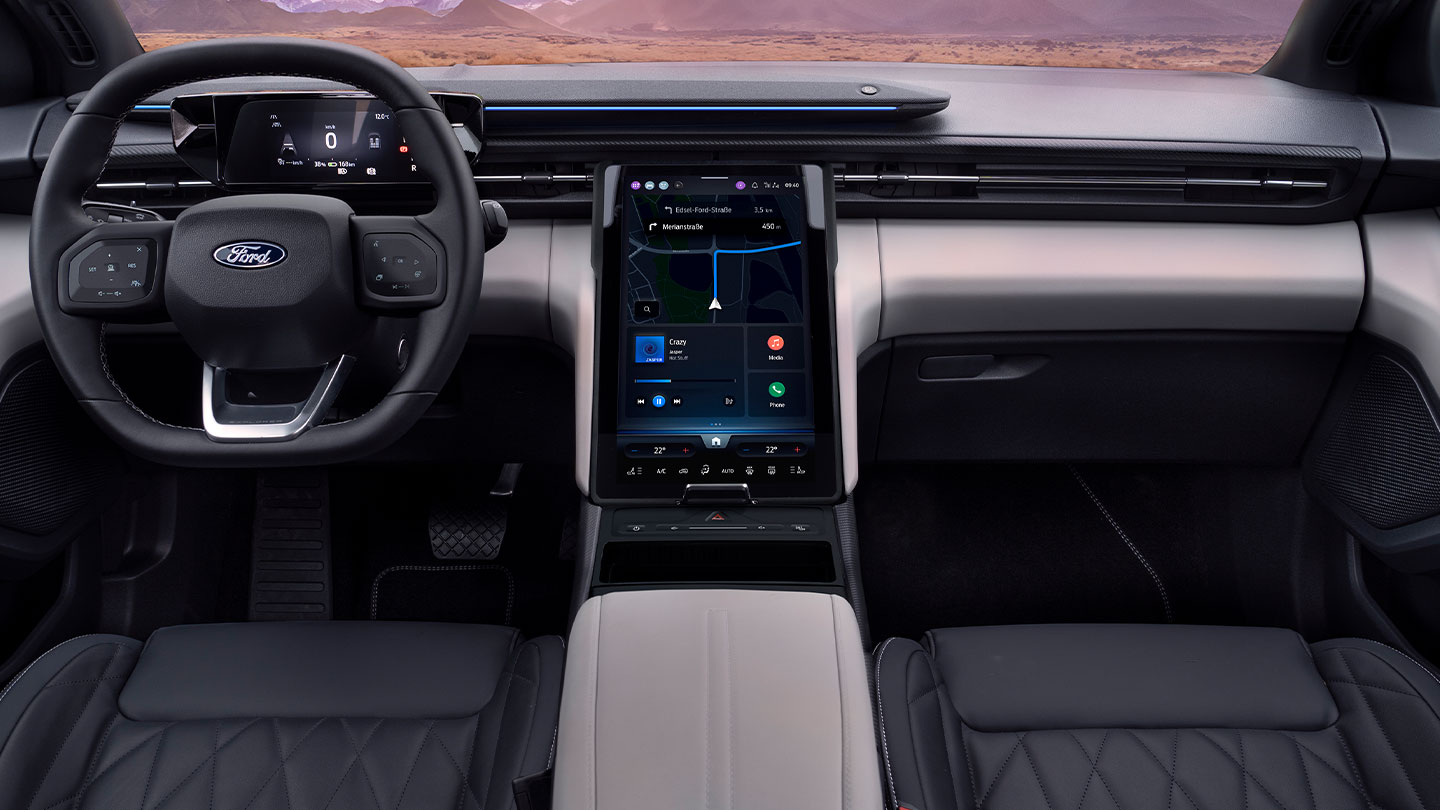 Um grande plano do painel de instrumentos do Ford Explorer, mostrando o volante e o grande ecrã tátil SYNC Move de 14,6”.