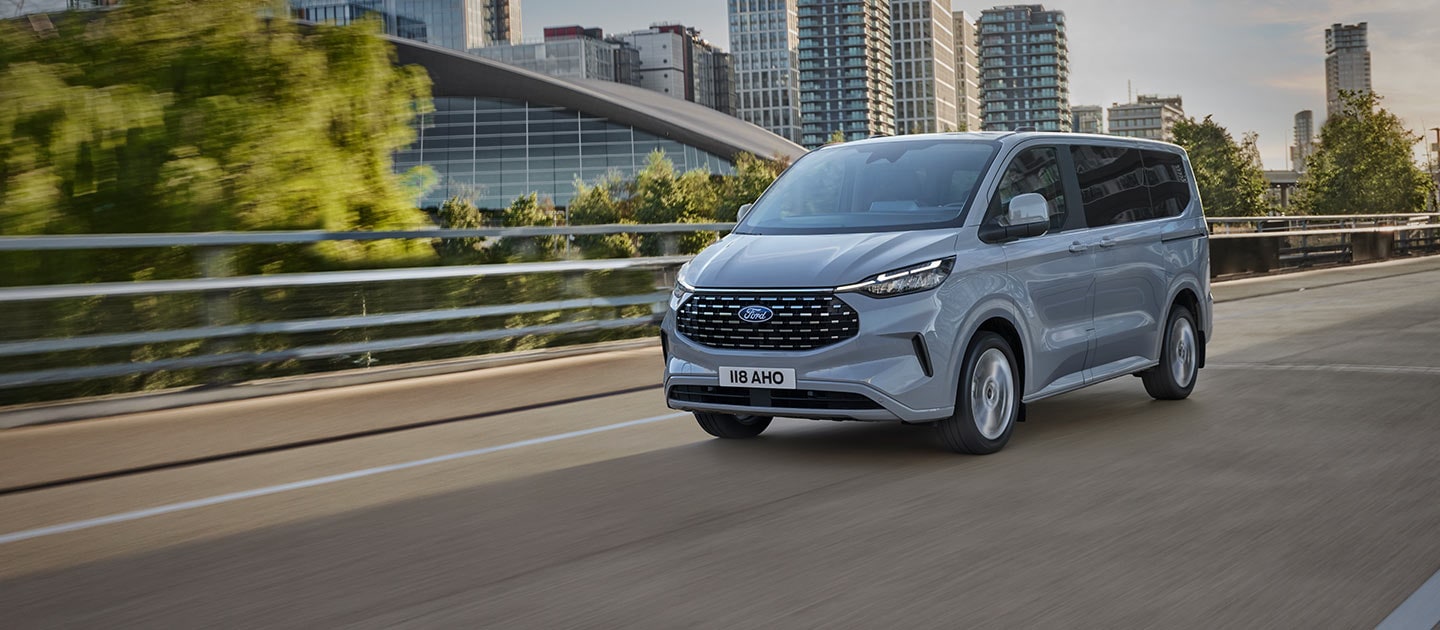 Gray All-New Tourneo Custom on a city street